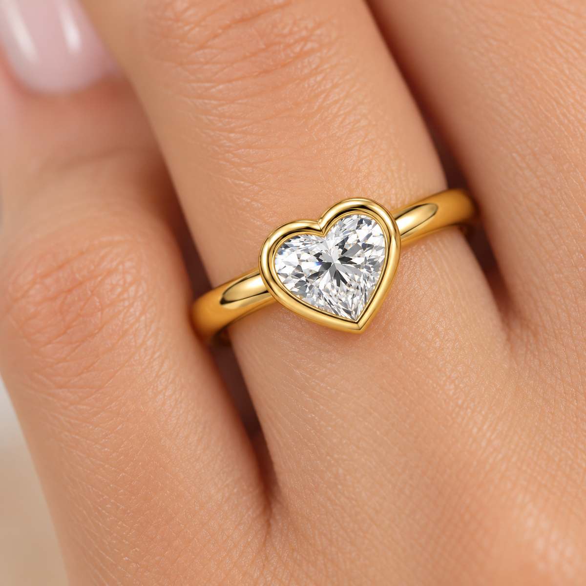 Close-up of lab grown diamond in a polished 14K gold bezel setting