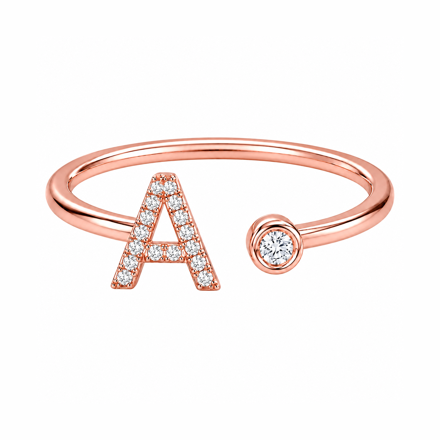 Rose gold ring with letter 'A' and small diamond on a white background