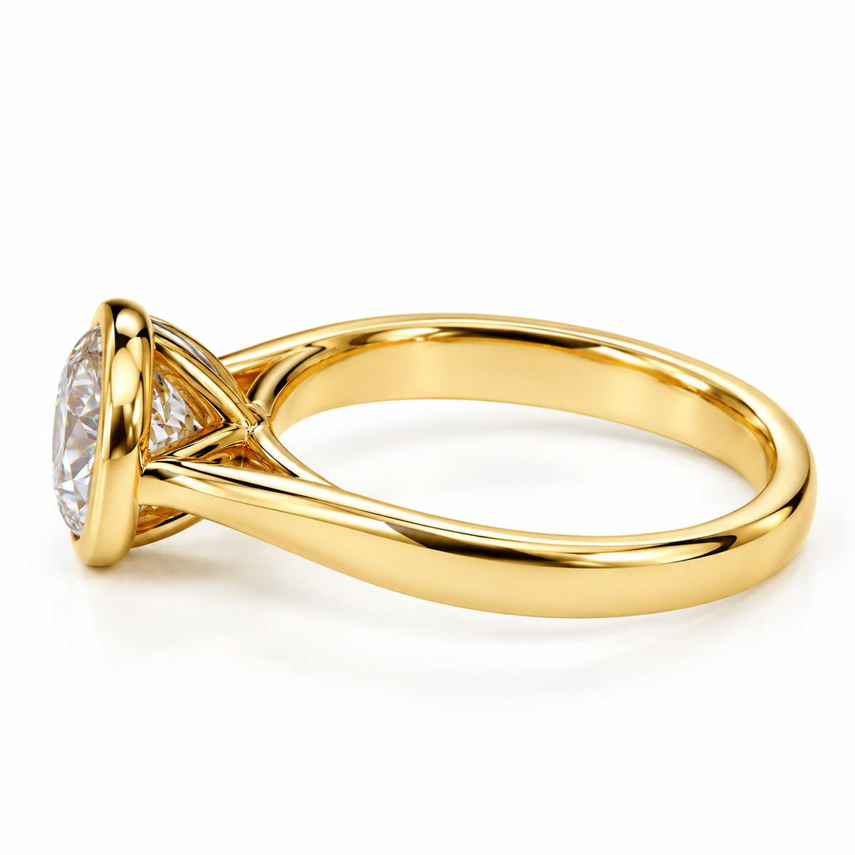 Side view of a 14K gold bezel set lab grown diamond ring